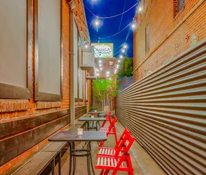 Contemporary Restaurant and Entertainment Venue Photo 2